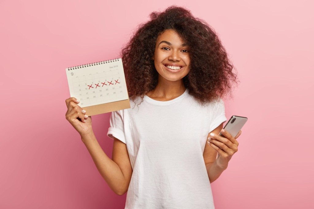 lady holding a period calendar